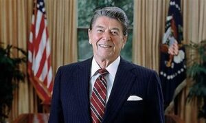 President Ronald Reagan signing the Economic Recovery Tax Act of 1981, a cornerstone of Reagan Economic Policy